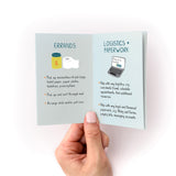 How to Support Someone Zine featuring an open booklet displaying two pages with illustrations and text about errands and logistics. The left page shows icons for groceries and supplies, while the right page shows a laptop icon with paperwork tasks, all on a soft mint background.
