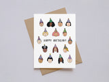 Birthday card with diverse illustrated faces wearing party hats and cheerful "Happy Birthday" text on white background