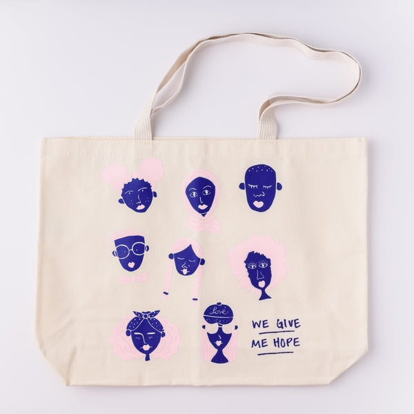Unique canvas tote bag design with illustrated We Give Me Hope design 