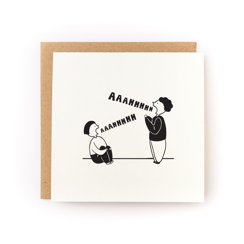 Scream Into the Void Letterpress Card featuring a minimalist black and white illustration of two figures screaming together, printed on white cardstock with a kraft paper envelope. Simple line drawing shows characters expressing shared frustration in a whimsical, relatable style.