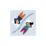 Take Regular Breaks Sticker featuring minimalist illustration of two people lying down and resting on a light blue background, with curved text reading 'Don't forget to take regular breaks'. Designed in navy blue, orange, green, and white colors in a modern, casual style.