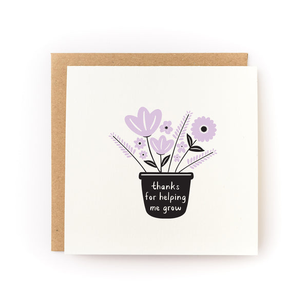 Thanks for Helping Me Grow Letterpress Card featuring a minimalist illustration of lavender flowers in a black pot against a white background, paired with a kraft paper envelope. Hand-printed design shows delicate florals and text in a simple, modern style.