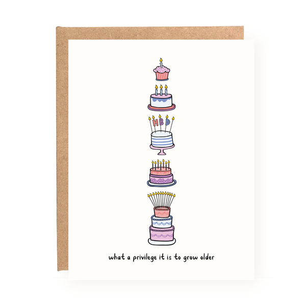 What a Privilege to Grow Older Birthday Card with stacked birthday cakes and text on white cardstock with kraft envelope.