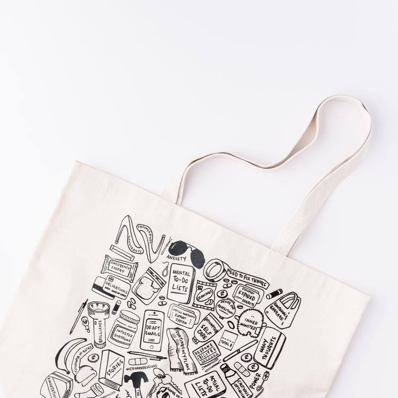 Flat lay of cotton tote bag on a white background. 