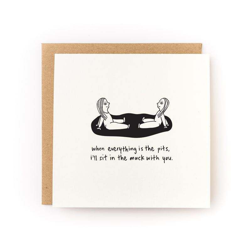 Thoughtful sympathy card or encouragement card for someone who is grieving or going through a tough time. The card has a white background and black illustration of two people sitting facing each other in the mud, with the words, I'll Sit in the Muck With YOu.