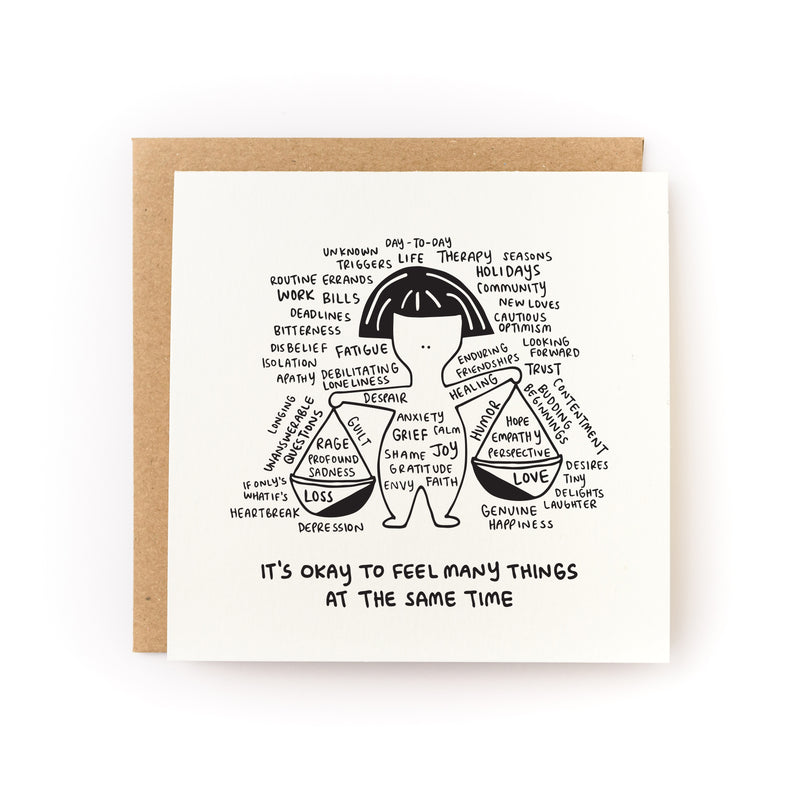 Thoughtful sympathy card or encouragement card for someone who is grieving or going through a tough time. The card has a white background and black illustration of a person who is juggling many different emotions. 