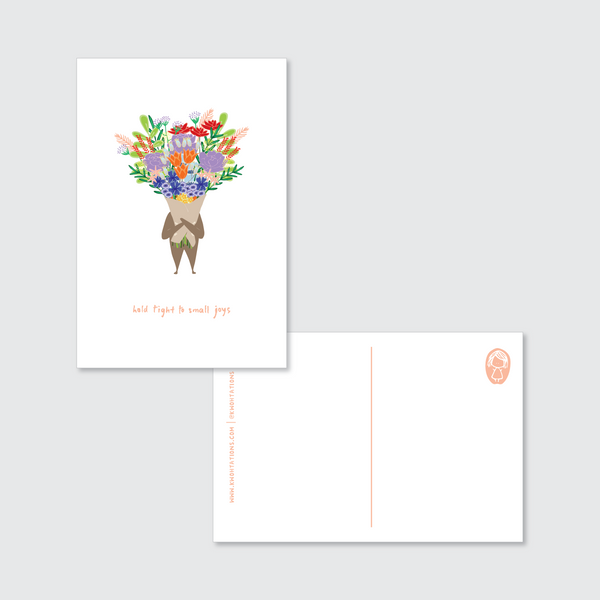 Beautiful motivational postcard with an illustration of someone holding a bouquet of flowers with the reminder "Hold Tight To Small Joys." The back is blank and non glossy, perfect for easy writing